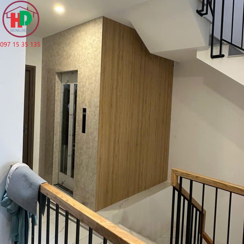 Thi công tấm nhựa giả đá ốp thang máy nhanh gọn, đẹp