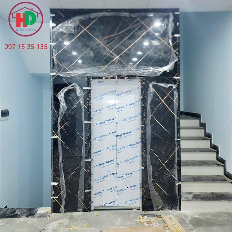 Thang máy hoàn thiện với tấm nhựa PVC giả đá 2025